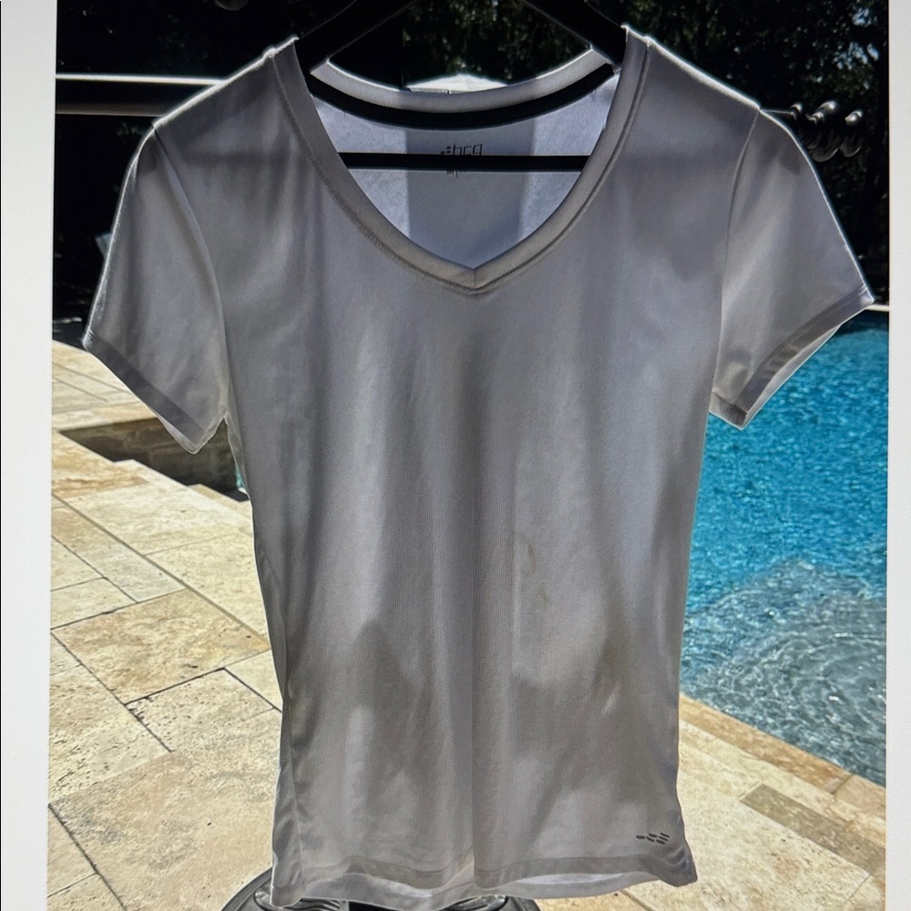 BCG Women's White V-Neck Top

- moisture wicking technology
- 100% polyester